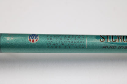 Close-up of a mint condition St. Croix Avid Inshore VIC80HF 8'0" Heavy used casting rod, labeled "USA" and "FAST ACTION." Ideal for upgrading through our rod and reel trade-in program for store credit.