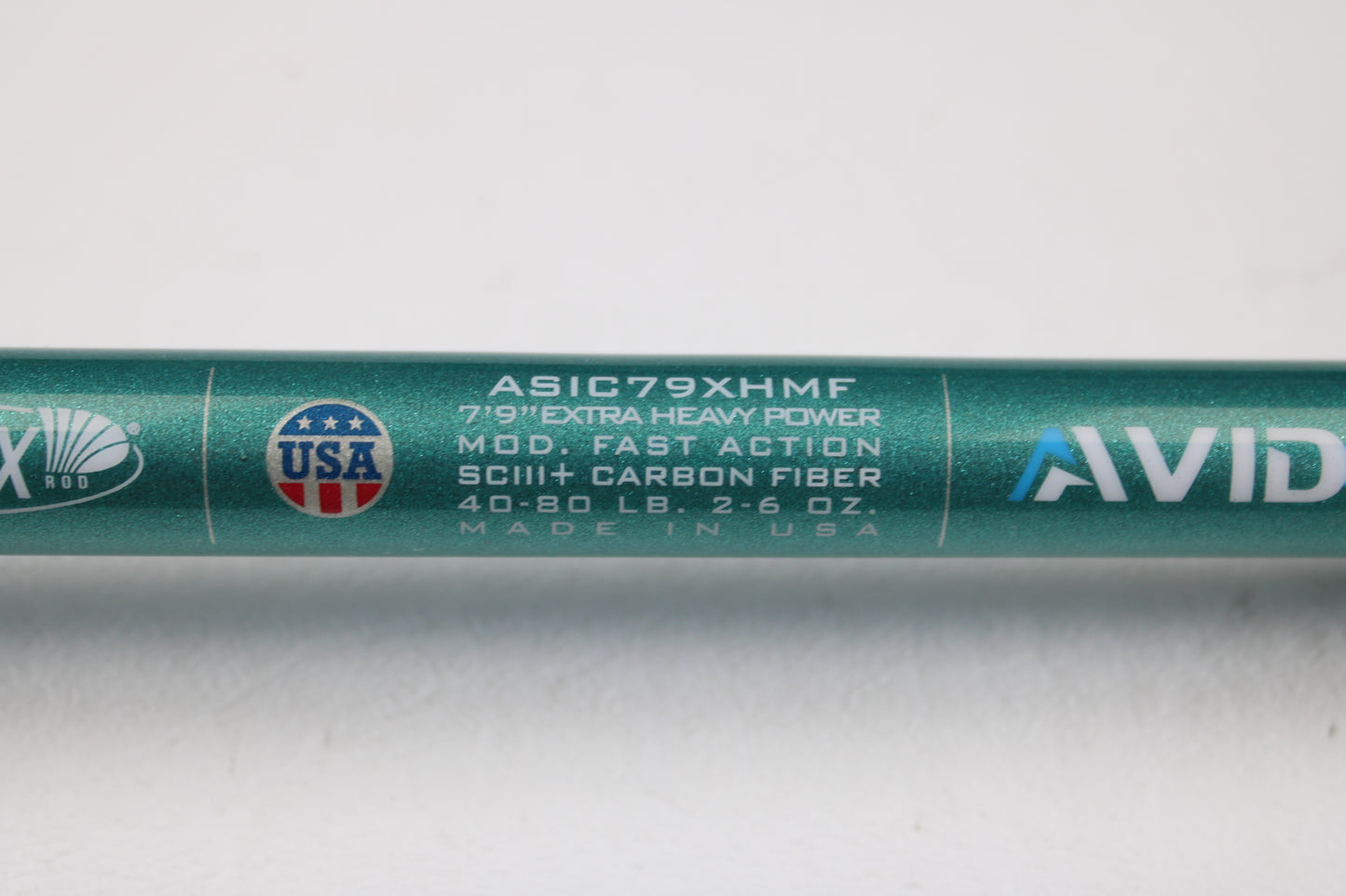 A close-up of a St. Croix Avid Inshore ASIC79XHMF 7'9" Extra Heavy Casting Rod (used, mint), showing specs and logos. Made in USA. Eligible for our rod and reel trade-in program for store credit on used gear.