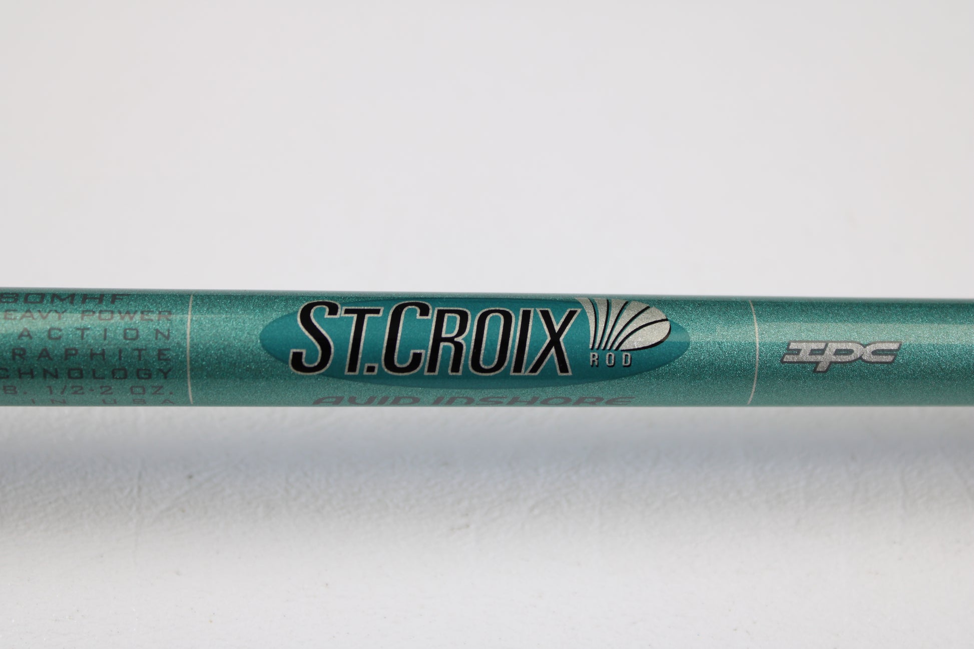 A close-up of the St. Croix Avid Inshore VIC80MHF 8'0" Medium Heavy casting rod in mint condition, showing "ST. CROIX ROD" and "IPC" logos—ideal for shoppers seeking quality used gear or exploring our trade-in program.
