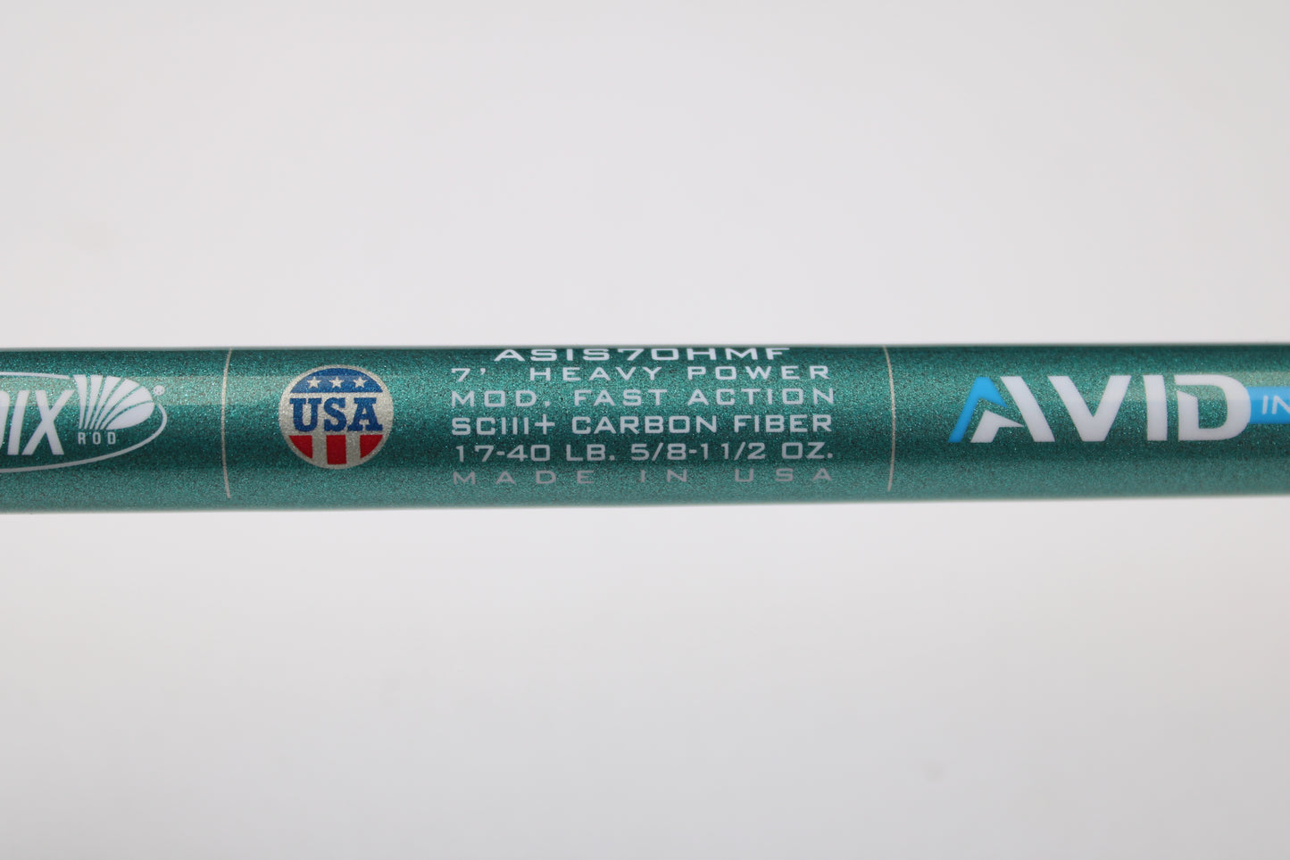 Close-up of a St. Croix Avid Inshore ASIS70HMF 7'0" heavy, moderate fast action SCIII carbon spinning rod—mint condition, made in USA. Trade in your used rods and reels for store credit with our trade-in program!.
