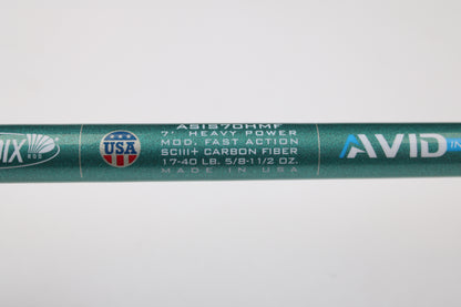 Close-up of a St. Croix Avid Inshore ASIS70HMF 7'0" heavy, moderate fast action SCIII carbon spinning rod—mint condition, made in USA. Trade in your used rods and reels for store credit with our trade-in program!.