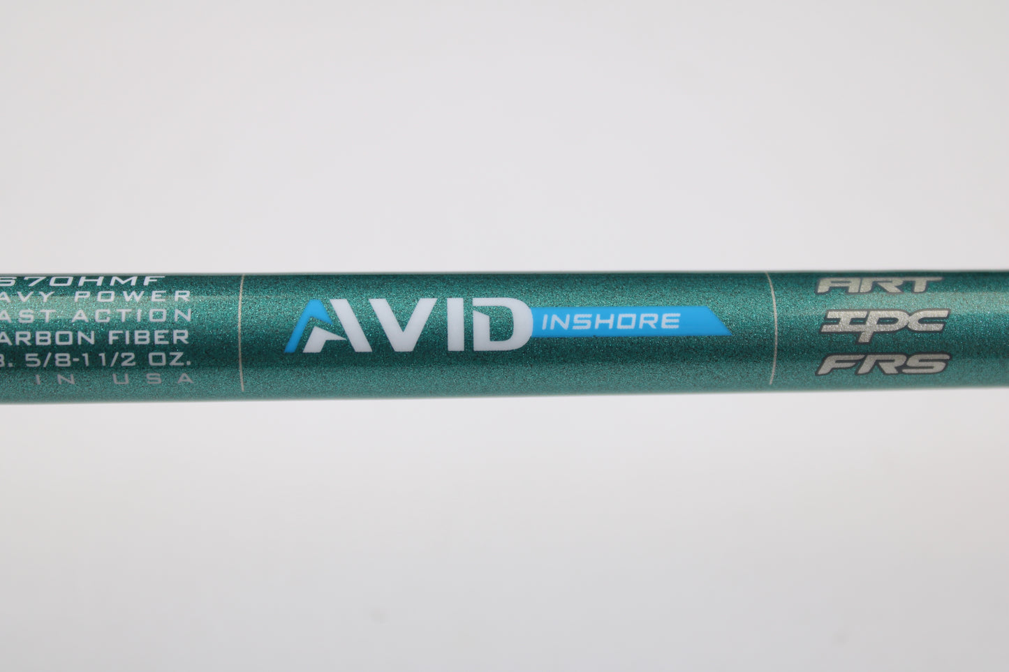A close-up of the St. Croix Avid Inshore ASIS70HMF 7'0" Heavy Used Spinning Rod in mint condition highlights its features—perfect for our rod and reel trade-in program, where you get store credit for your used gear.
