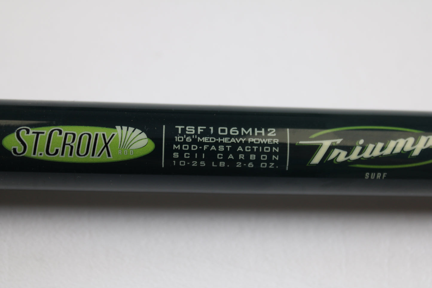 Close-up of St. Croix Triumph Surf TSF106MH2 10'0" Medium Heavy 2-Piece Used Spinning Rod in mint condition—eligible for our Rod and Reel Trade-In Program for store credit on used gear.