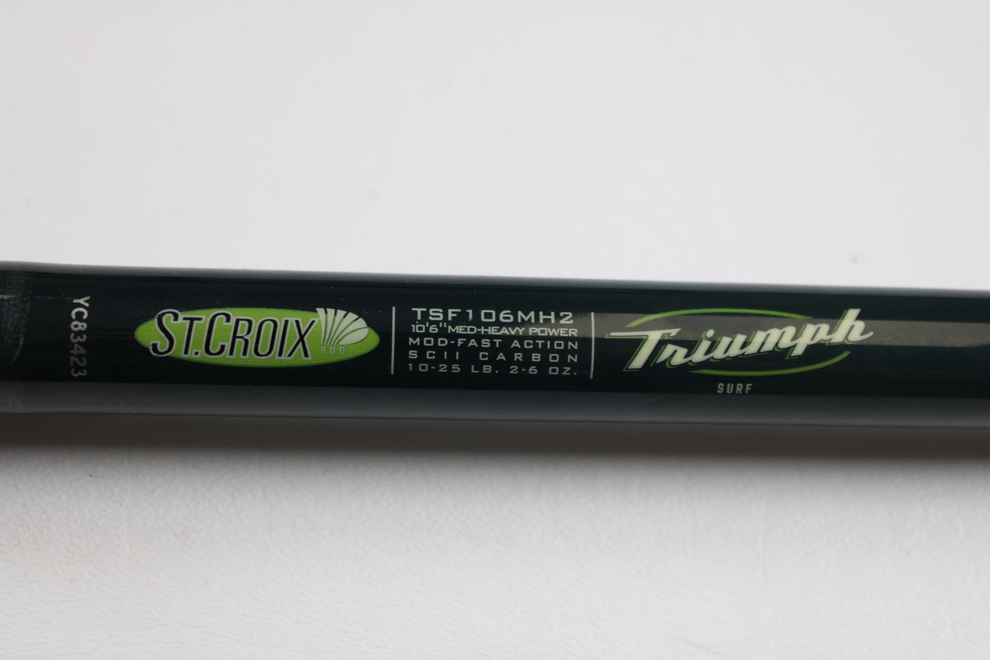 Close-up of a St. Croix Triumph Surf TSF106MH2 10'0" Medium Heavy 2 Piece Used Spinning Rod in mint condition. Great for anglers to upgrade through our Rod and Reel Trade-In Program or earn store credit for used gear.