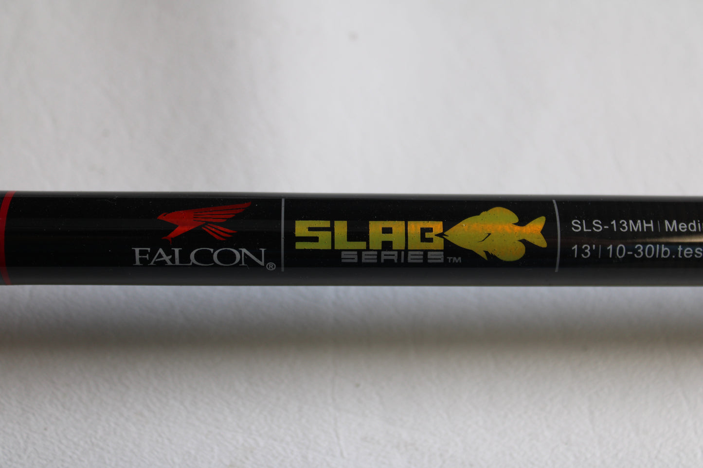 Close-up of a Falcon Slab Series SLS13MH 13'0" Medium Heavy 3pc used spinning rod in excellent condition—ideal for anglers seeking quality used gear or considering a rod and reel trade-in.