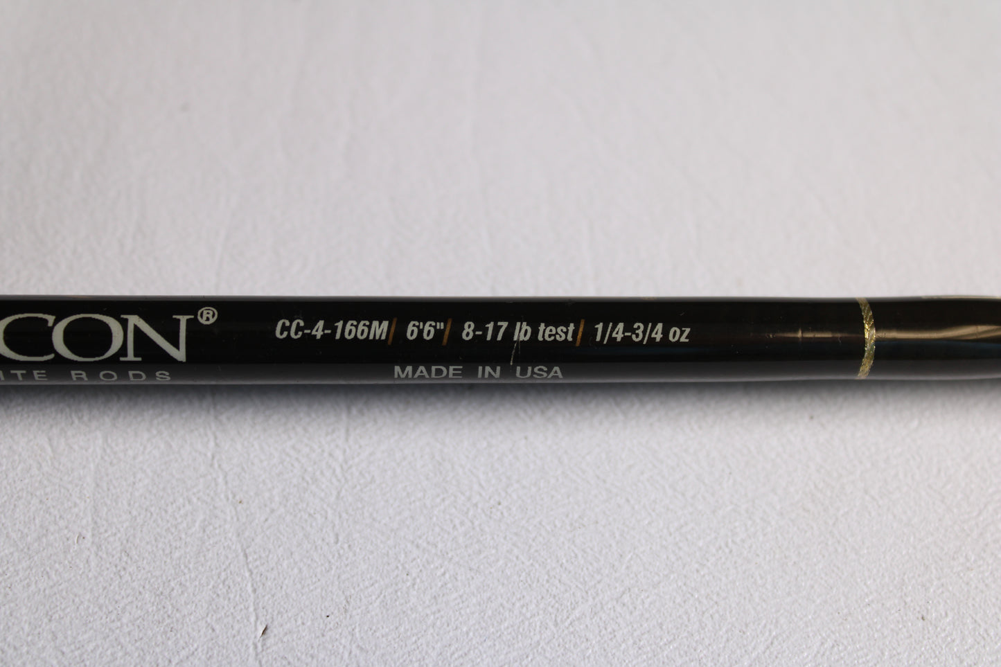 A close-up of the Falcon Cara T7 CC-4-166M 6'6" Medium Used Casting Rod (very good condition) showing specs: 8-17 lb line, 1/4-3/4 oz lure, Made in USA—ideal for used gear fans or rod and reel trade-in credit.
