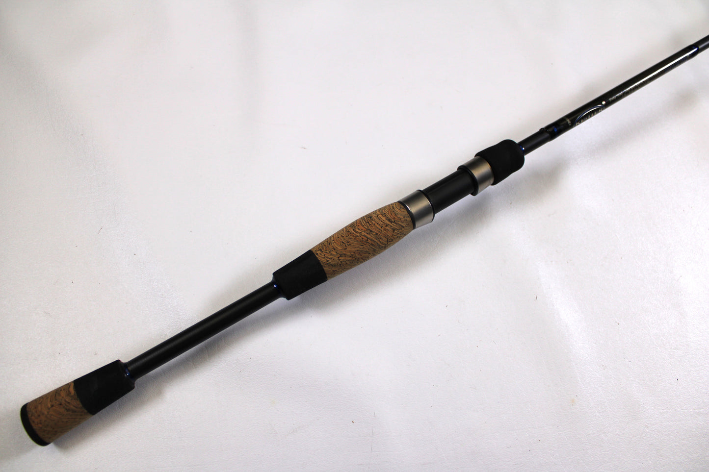 The Kistler Helium MIC-HESHTB70MHS 7'0" Medium Heavy Used Spinning Rod, in excellent condition, is ideal for upgrading your fishing gear or trading in through the Rod and Reel Trade-In Program.