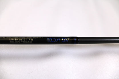 Close-up of a used Kistler Helium MIC-HESHTB70MHS 7'0" Medium Heavy spinning rod in excellent condition, with specs "1/8-3/4 OZ 12-17 LB"—ideal for our Rod and Reel Trade-In Program or store credit.