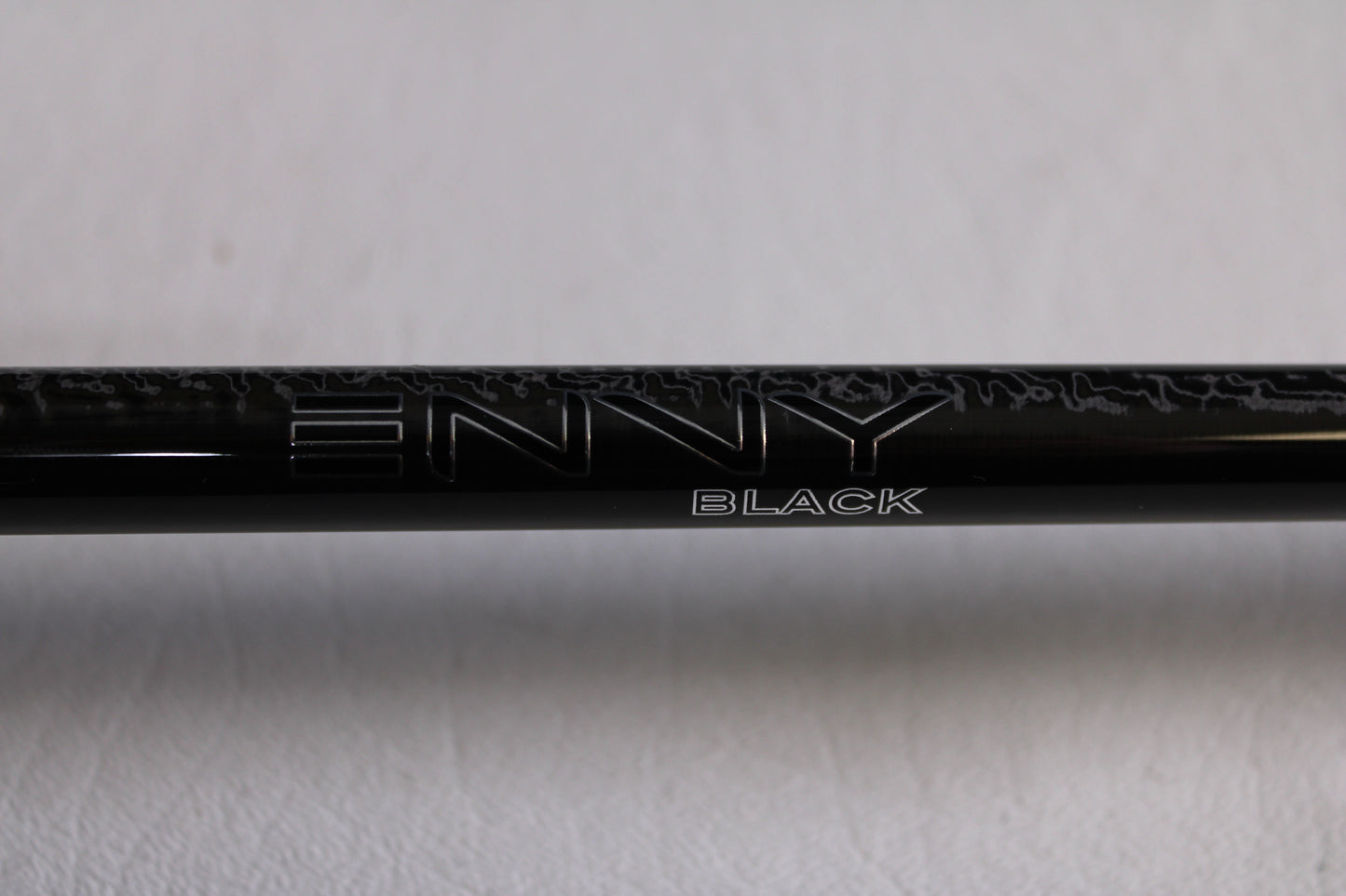 Close-up of a 13 Fishing Envy Black 3 EB3C76MH 7'6" Medium Heavy used casting rod in mint condition—ideal for anglers seeking quality pre-owned fishing gear or interested in rod and reel trade-ins.