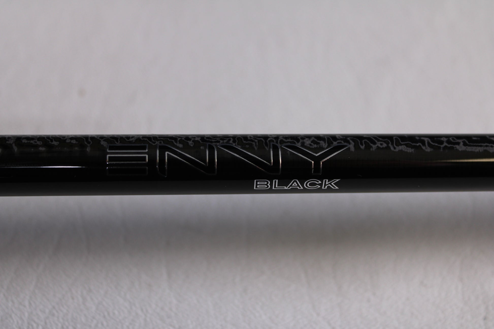 Close-up of a 13 Fishing Envy Black 3 EB3C76MH 7'6" Medium Heavy used casting rod in mint condition—ideal for anglers seeking quality pre-owned fishing gear or interested in rod and reel trade-ins.