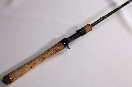 A close-up of the 13 Fishing Omen Green OG2C68M 6'8" Medium Used Casting Rod—Good Condition—ideal for anglers seeking quality pre-owned gear or taking advantage of our rod and reel trade-in program for store credit.