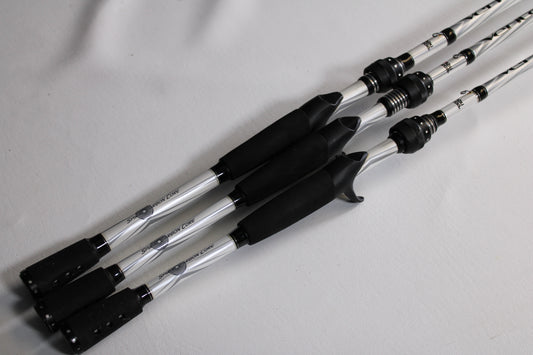 Three Abu Garcia Veritas 2.0 used casting rods (7'3" MH, 7'0" MH, 6'6" M) in good condition, side by side—ideal for upgrading via our rod and reel trade-in program.