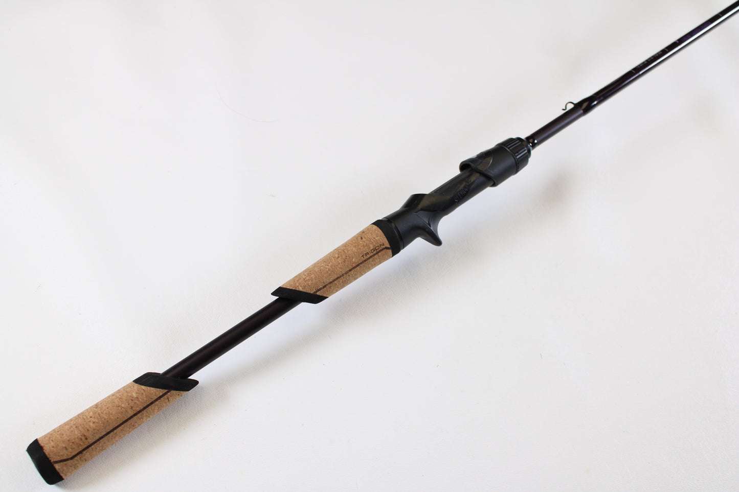 A St. Croix Mojo Bass JOC72MHMF Finesse Carbon Cranker 7'2" Medium Heavy Used Casting Rod in excellent condition, featuring a cork handle and black reel seat, photographed diagonally on a white background—ideal for used gear shoppers.
