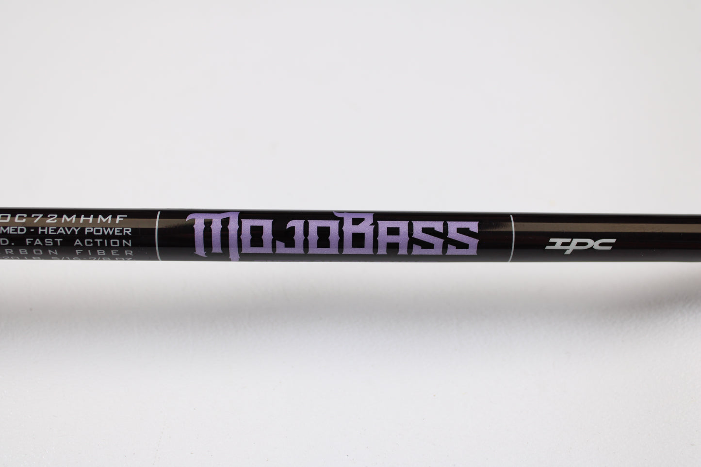 A close-up of a St. Croix Mojo Bass JOC72MHMF Finesse Carbon Cranker 7'2" Medium Heavy casting rod in excellent used condition—ideal for those interested in our Rod and Reel Trade-In Program or upgrading their gear.