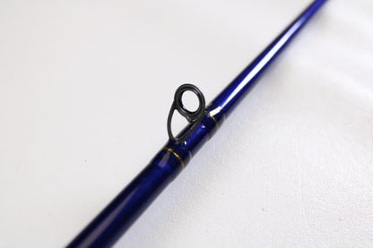 A close-up of the St. Croix Legend Tournament Pike Versatile Special LTPC216MHF 7'1" Medium Heavy Used Casting Rod, in excellent condition, highlights a black and silver guide ring against a white background—ideal for our trade-in program.