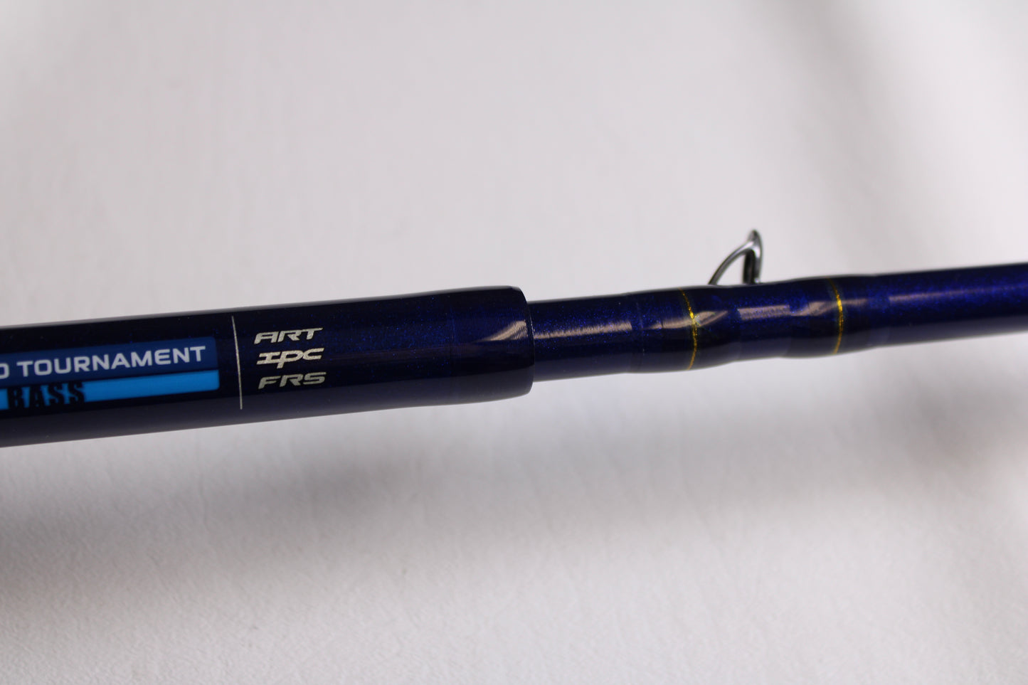 Close-up of a St. Croix Legend Tournament Bass LBTC86XXHFT Magnum Swimbait 8'6" XXH Used Casting Rod in mint condition, featuring a metallic guide ring and yellow thread wraps, part of our Rod and Reel Trade-In Program.