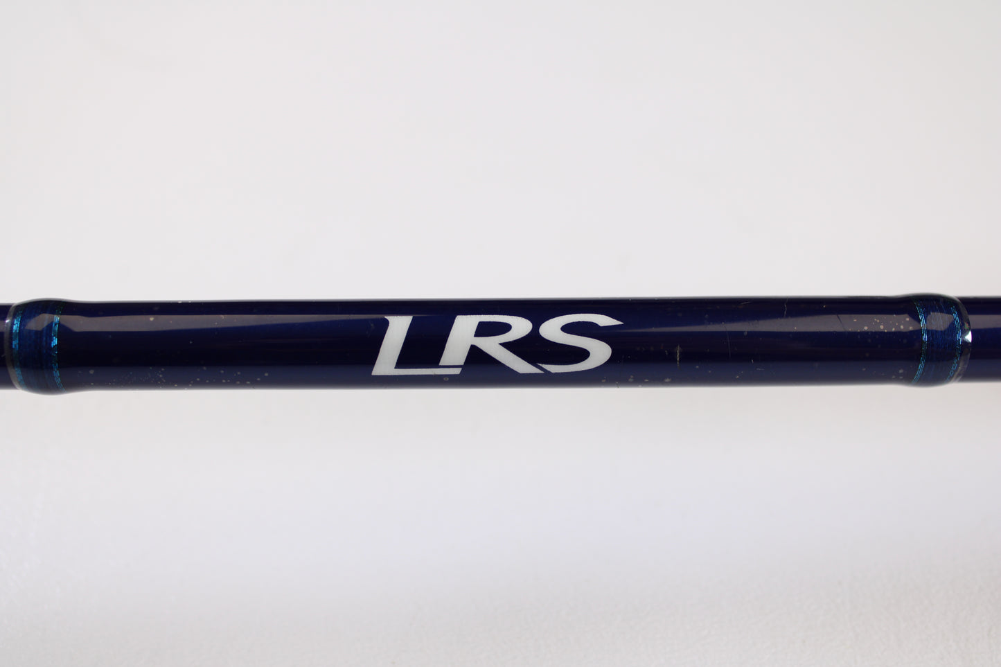 A Douglas LRS C704M 7'0" Medium, used casting rod in very good condition, featuring dark blue color with "LRS" in white—ideal for anglers upgrading via our Rod and Reel Trade-In Program or earning store credit with used gear.