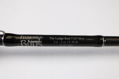 Close-up of a Fitzgerald Original TLR710H The Ledge Rod 7'10" Heavy Used Casting Rod (Very Good Condition) against a white background—ideal for anglers upgrading with our Rod and Reel Trade-In Program.