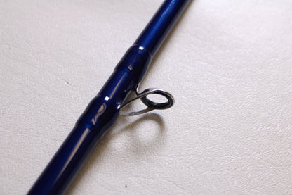 A close-up of the Douglas LRS LRSC784F 7'8" Medium used casting rod in excellent condition, highlighting a metal line guide—ideal for listing your pre-owned gear in our rod and reel trade-in program for store credit.