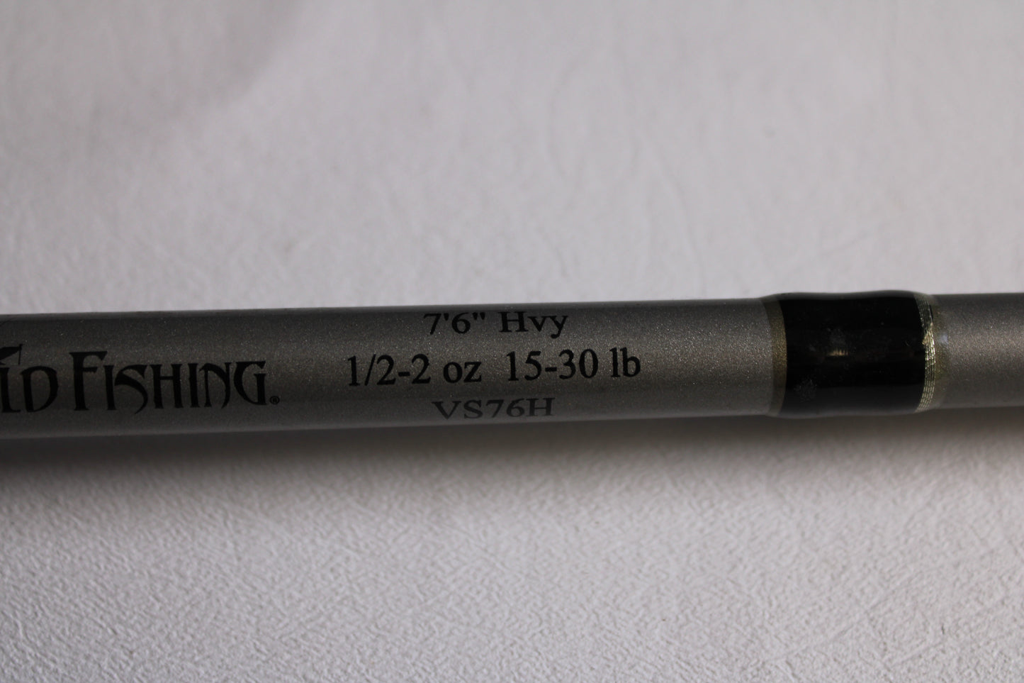 A close-up of a Fitzgerald Vursa VS76H Pitchin' & Flippin' 7'6" Medium Used Casting Rod shows its specs against a plain background—ideal for anglers trading in gear for store credit. Brand: Fitzgerald. Condition: Good.