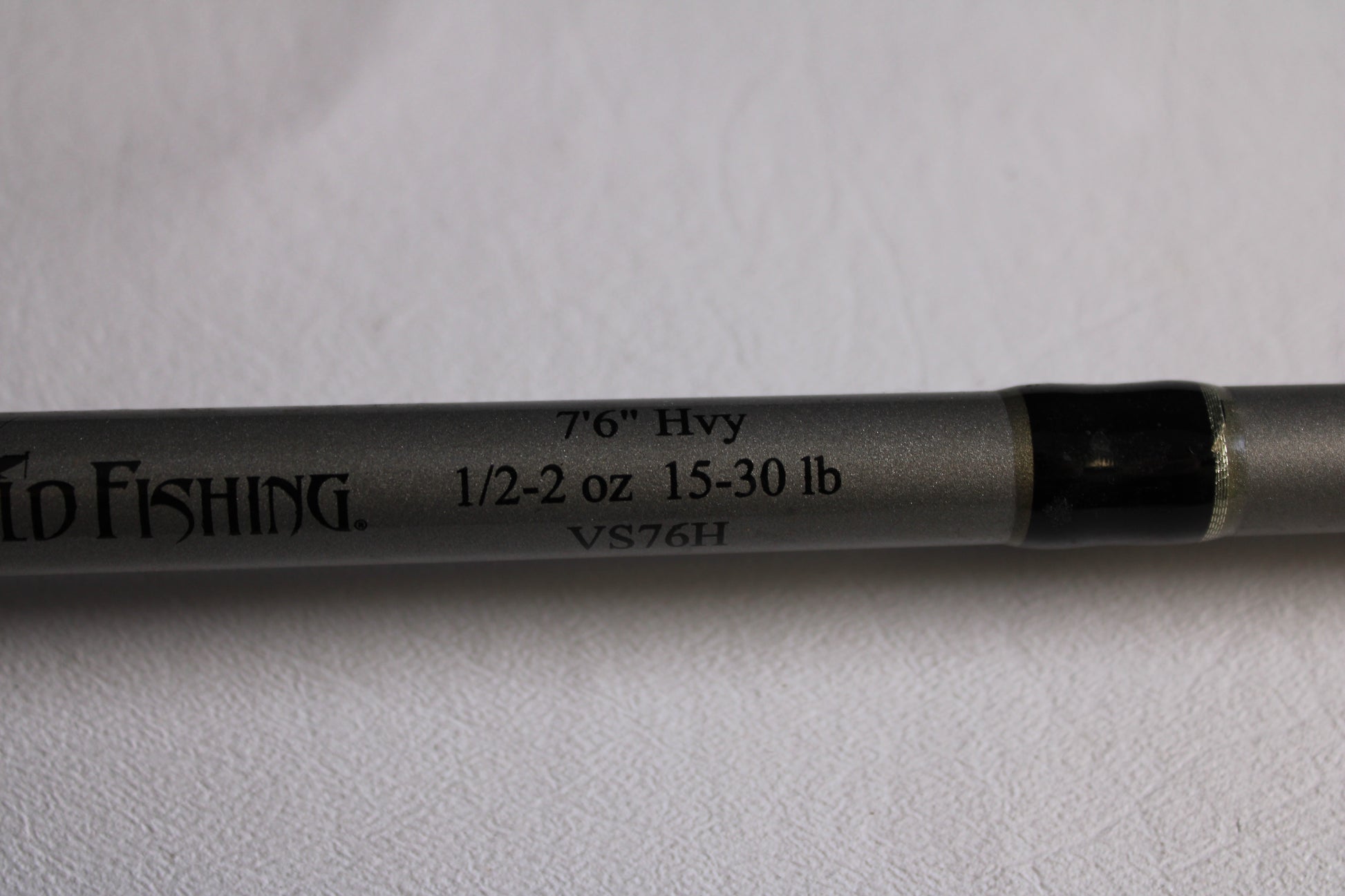 A close-up of a Fitzgerald Vursa VS76H Pitchin' & Flippin' 7'6" Medium Used Casting Rod shows its specs against a plain background—ideal for anglers trading in gear for store credit. Brand: Fitzgerald. Condition: Good.