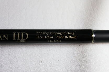Close-up of Fitzgerald Titan HD THD76H 7'6" Heavy Used Casting Rod in very good condition—features 1/2-1 1/2 oz, 20-80 lb braid. Eligible for our Rod and Reel Trade-In Program—trade your used gear for store credit today!.