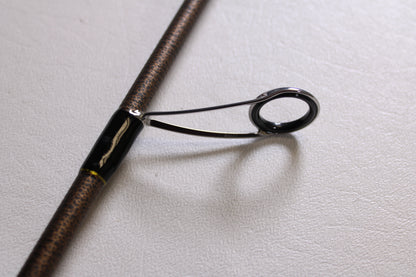 A close-up of the metal guide and support on the Favorite Fishing Rush RUH-661MH 6'6" Medium Heavy spinning rod—used, in mint condition—ideal for anglers shopping pre-owned gear or exploring our rod and reel trade-in program.