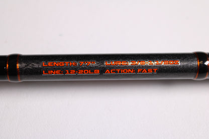 Close-up of Favorite Fishing Rush Zach Birge RUHC-ZB-771H 7'7" Heavy used casting rod in excellent condition, showing specs—3/8–1 1/2 oz lure, 12–20 lb line, fast action—ideal for our Rod and Reel Trade-In Program for store credit.