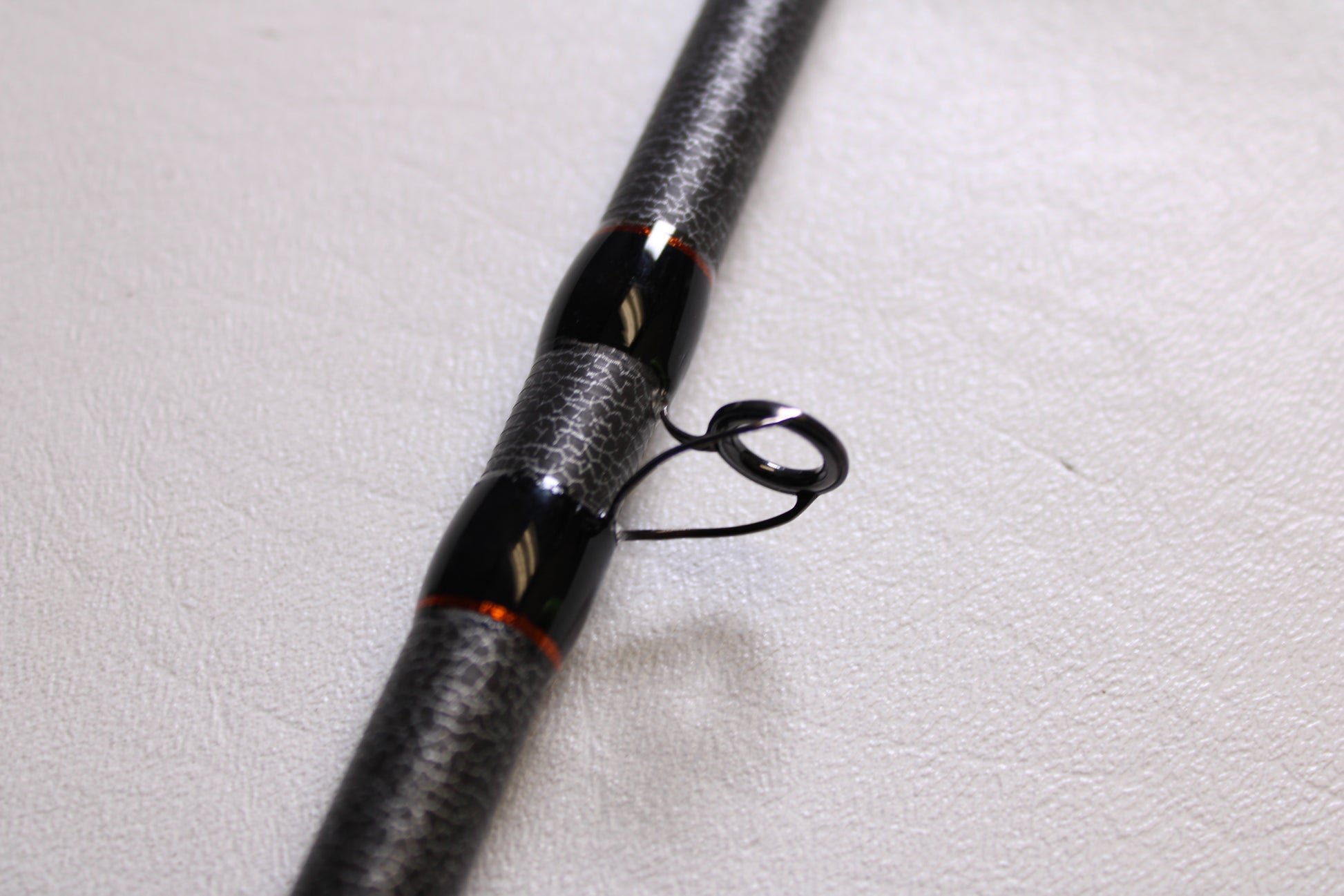 Close-up of the Favorite Fishing Rush Zach Birge RUHC-ZB-771H 7'7" Heavy Used Casting Rod in excellent condition—ideal for upgrading your gear with our Rod and Reel Trade-In Program.