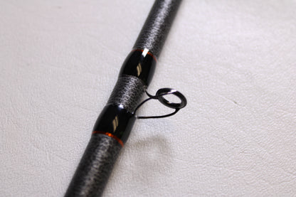 Close-up of the Favorite Fishing Rush Zach Birge RUHC-ZB-771H 7'7" Heavy Used Casting Rod in excellent condition—ideal for upgrading your gear with our Rod and Reel Trade-In Program.