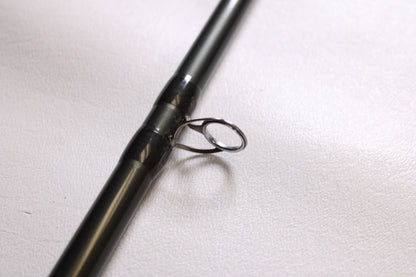 Close-up of a Temple Fork TFO Tactical Elite Bass TLE SB 726-1 7'2" Heavy Used Casting Rod in excellent condition—an ideal choice for those upgrading gear through our rod and reel trade-in program.