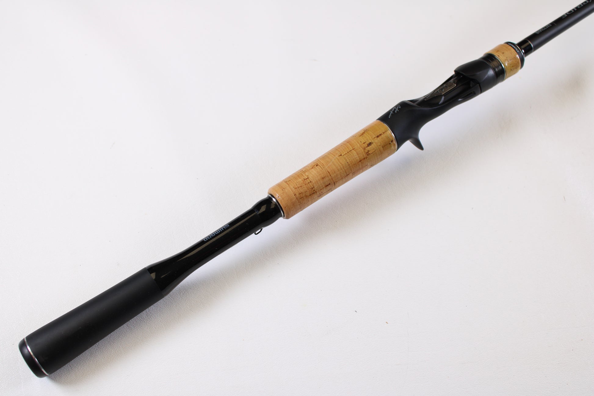The Shimano Expride B EXC72MHB 7'2" Medium Heavy Used Casting Rod (Excellent Condition) is shown on a white background—ideal for upgrading via our Rod and Reel Trade-In Program to earn store credit for your used gear.