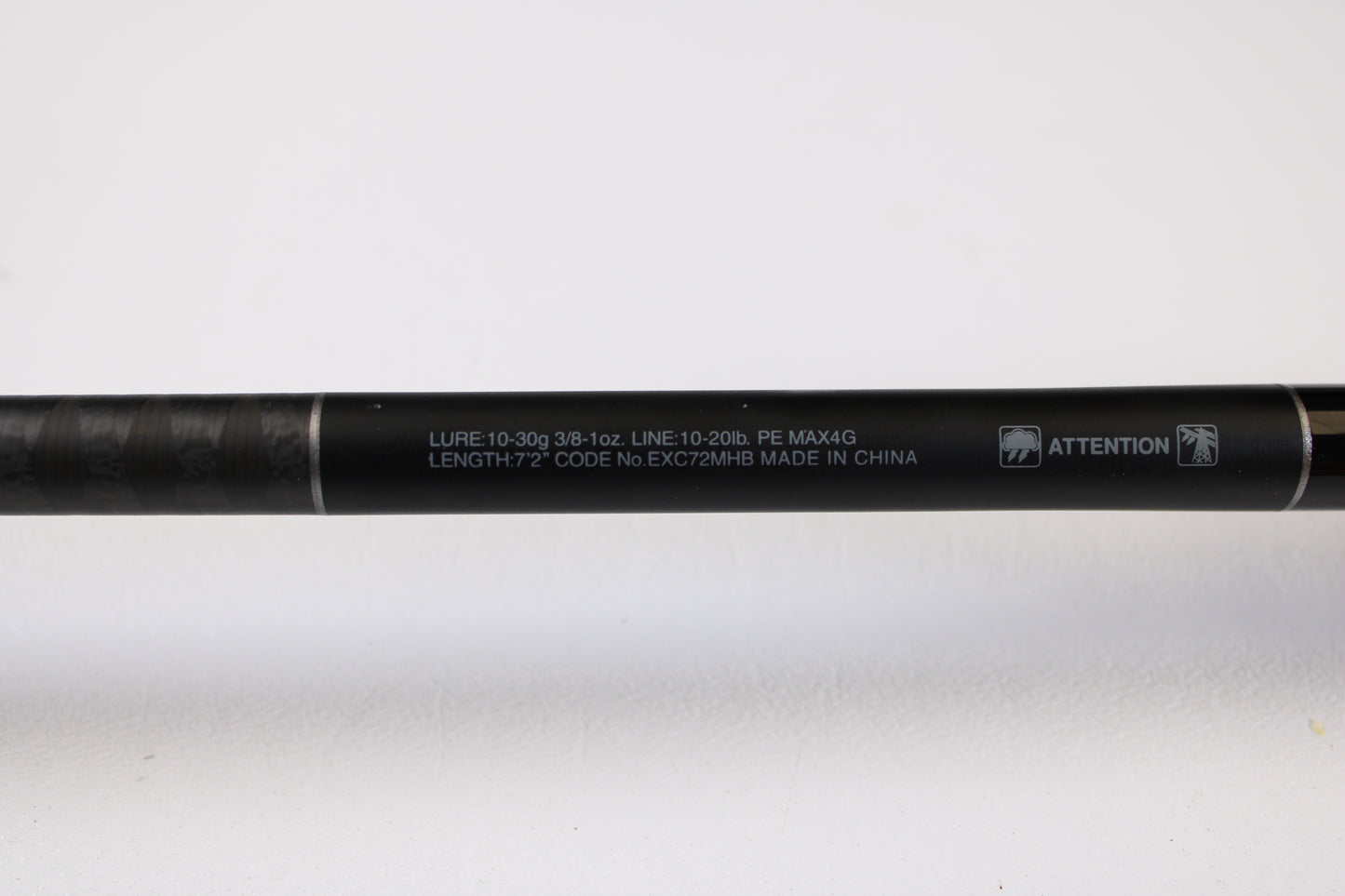 Close-up of the Shimano Expride B EXC72MHB 7'2" Medium Heavy casting rod in excellent condition, specs printed in white text—ideal for our Rod and Reel Trade-In Program, offering store credit for used Shimano gear.