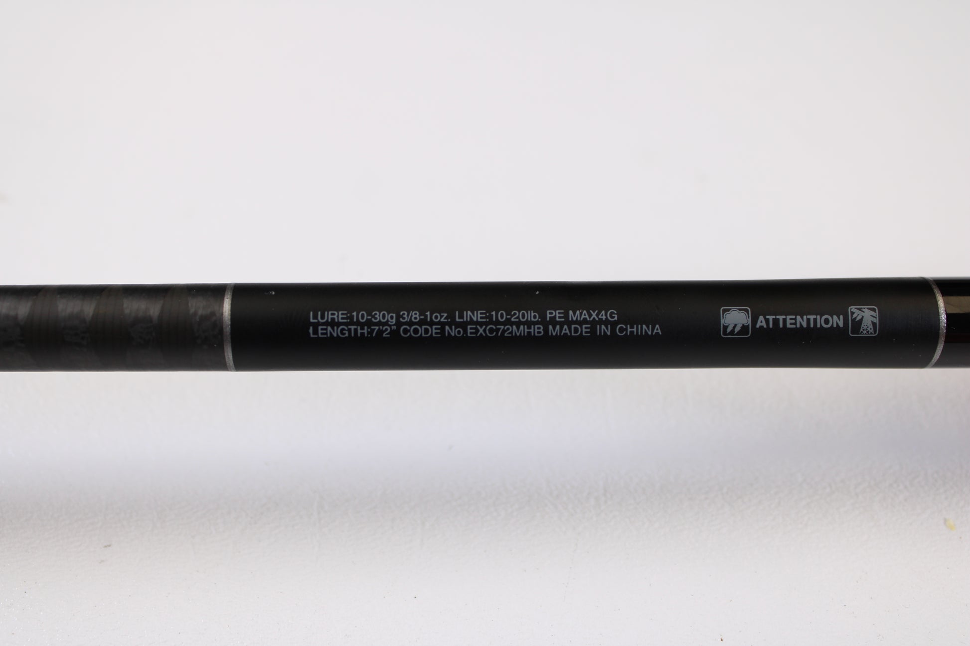 Close-up of the Shimano Expride B EXC72MHB 7'2" Medium Heavy casting rod in excellent condition, specs printed in white text—ideal for our Rod and Reel Trade-In Program, offering store credit for used Shimano gear.