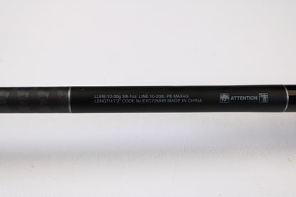 Close-up of the Shimano Expride B EXC72MHB 7'2" Medium Heavy casting rod in excellent condition, specs printed in white text—ideal for our Rod and Reel Trade-In Program, offering store credit for used Shimano gear.