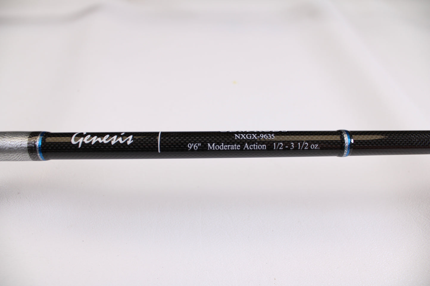 Close-up of the ODM Rods Genesis Surf NGX-9635 9'6" Used Spinning Rod in excellent condition against a plain white background—ideal for upgrading your gear or including top-quality used equipment in your collection.