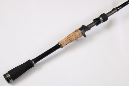 A close-up of the 13 Fishing Envy Black EBC76H 7'6" Heavy Used Casting Rod in very good condition—ideal for anyone interested in trading in or upgrading gear through our Rod and Reel Trade-In Program.