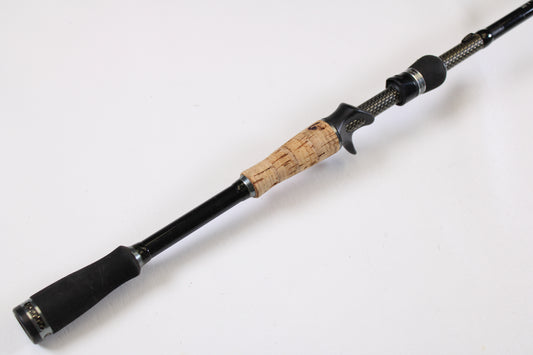 A close-up of the 13 Fishing Envy Black EBC76H 7'6" Heavy Used Casting Rod in very good condition—ideal for anyone interested in trading in or upgrading gear through our Rod and Reel Trade-In Program.