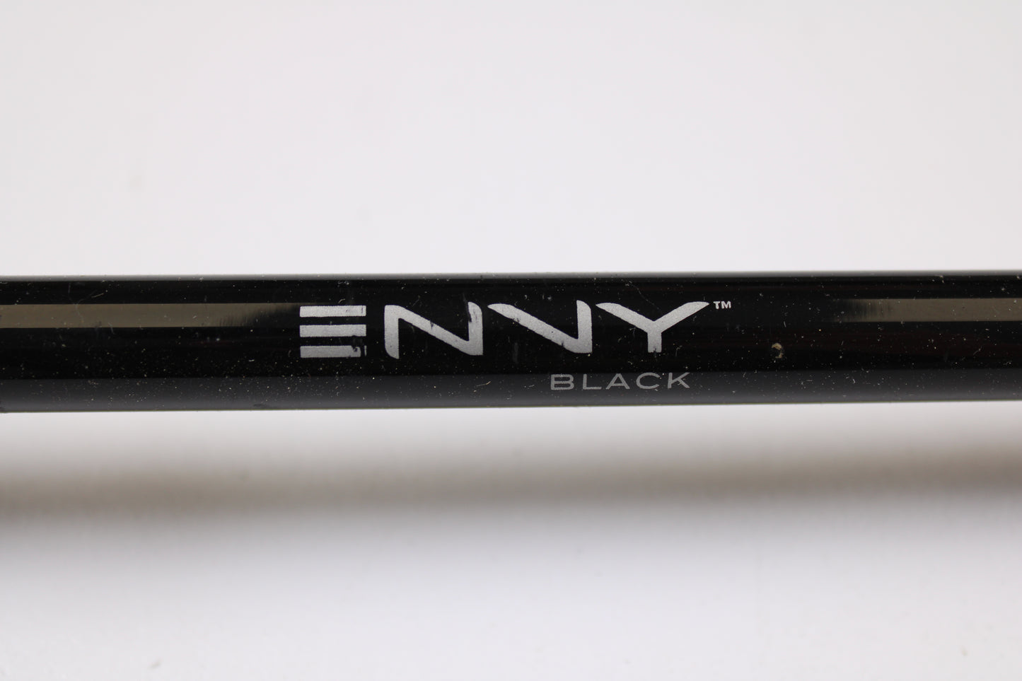 A close-up of a 13 Fishing Envy Black EBC76H 7'6" Heavy Used Casting Rod in very good condition—ideal for anglers upgrading gear through our Rod and Reel Trade-In Program for store credit.