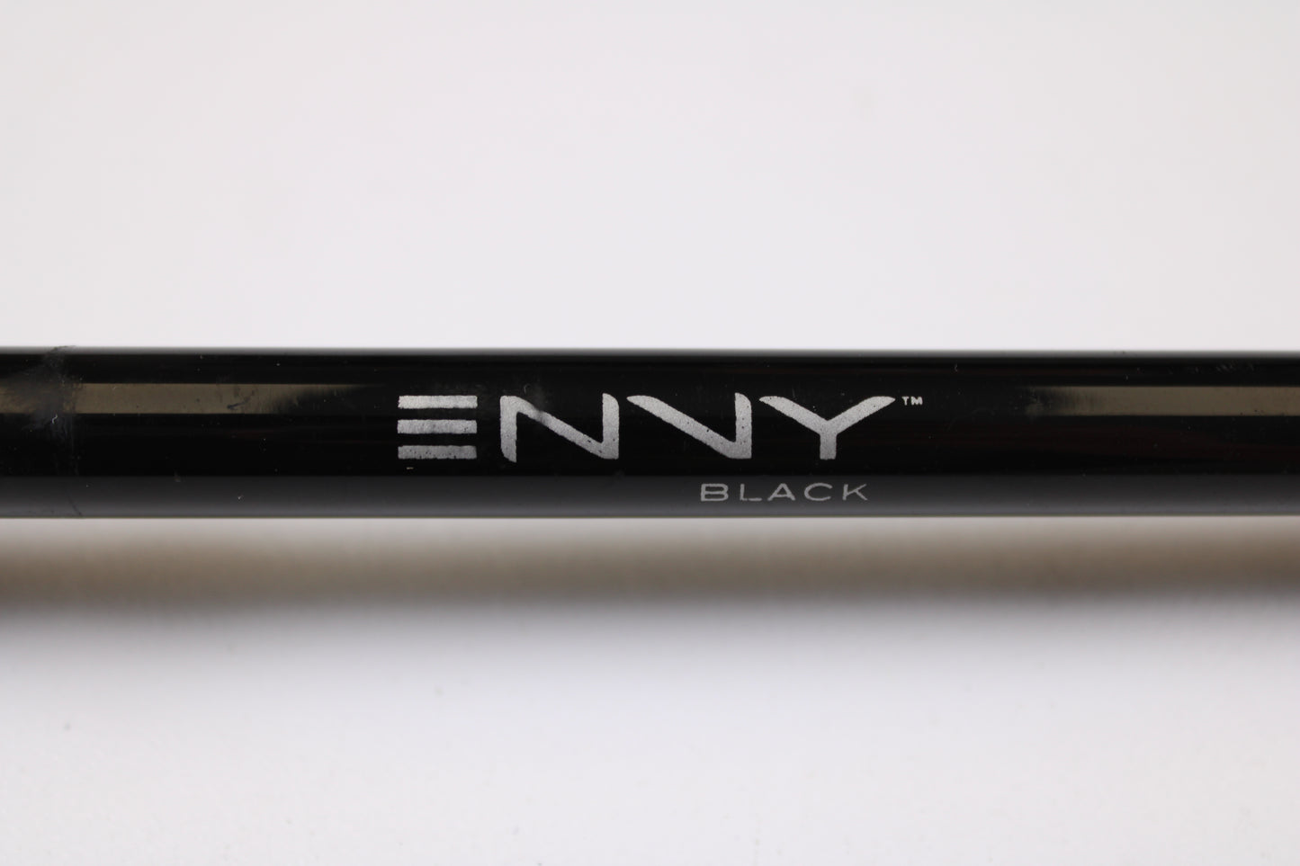 A close-up of a 13 Fishing Envy Black EBC711H 7'11" Heavy used casting rod in very good condition, featuring "ENVY" in silver letters and "BLACK" beneath, set against a plain white background—ideal for detailing trade-in or store credit offers.
