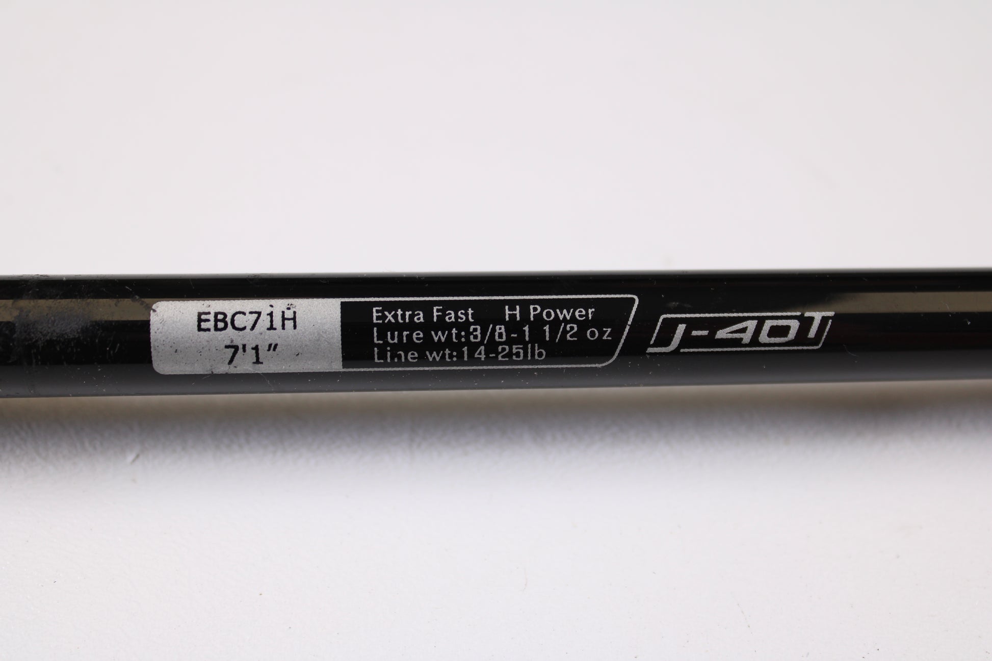 Close-up of a 13 Fishing Envy Black EBC71H 7'1" Heavy used casting rod in very good condition—upgrade your gear by trading in old rods and reels for store credit through our Rod and Reel Trade-In Program today.