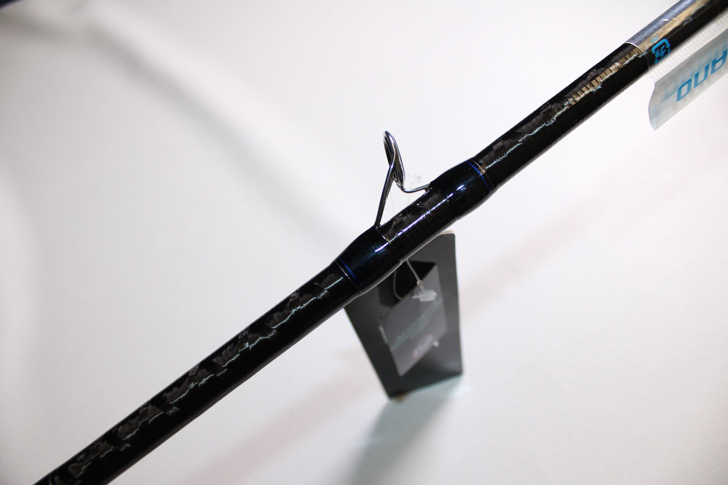 Close-up of a Shimano SKIXX SKC80XH Used Casting Rod in mint condition, shown with product tags and silver guide ring—ideal for those seeking quality used fishing gear or utilizing our rod and reel trade-in program.