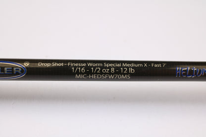 A close-up of a Kistler Helium LTA MIC-HEDSFW70MS 7'0" Medium used spinning rod in very good condition. Eligible for our Rod and Reel Trade-In Program—trade in your used gear for store credit.
