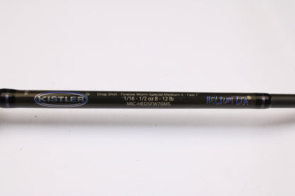 A close-up of the Kistler Helium LTA MIC-HEDSFW70MS 7'0" Medium Used Spinning Rod in very good condition, featuring model details—ideal for the Rod and Reel Trade-In Program.