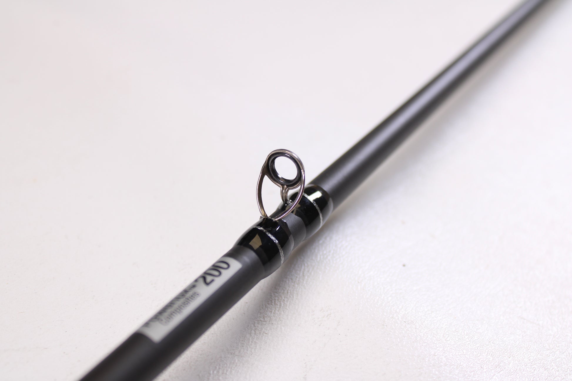 A close-up of the Abu Garcia Pro Series PSJCC76-6 John Cox Shallow Crankbait 7'6" Medium Heavy Used Casting Rod in excellent condition—ideal for anyone seeking quality used gear from Abu Garcia.