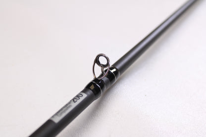 A close-up of the Abu Garcia Pro Series PSJCC76-6 John Cox Shallow Crankbait 7'6" Medium Heavy Used Casting Rod in excellent condition—ideal for anyone seeking quality used gear from Abu Garcia.