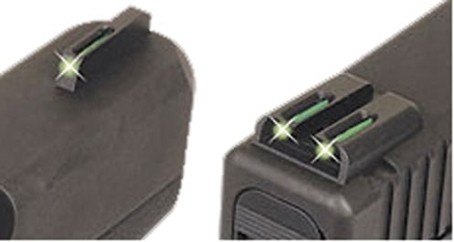 Close-up of TruGlo Tritium Handgun Sight Glock Low Green, featuring glowing green fiber optic inserts in both front and rear sights. These snag-resistant sights ensure quick target acquisition.