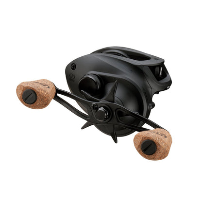The 13 Fishing Concept A3 Gen II Casting Reel 5.5:1 (CA3-5.5-RH) features a sleek black design and dual cork handle grips, shown from the side and front—ideal for your next saltwater fishing trip.