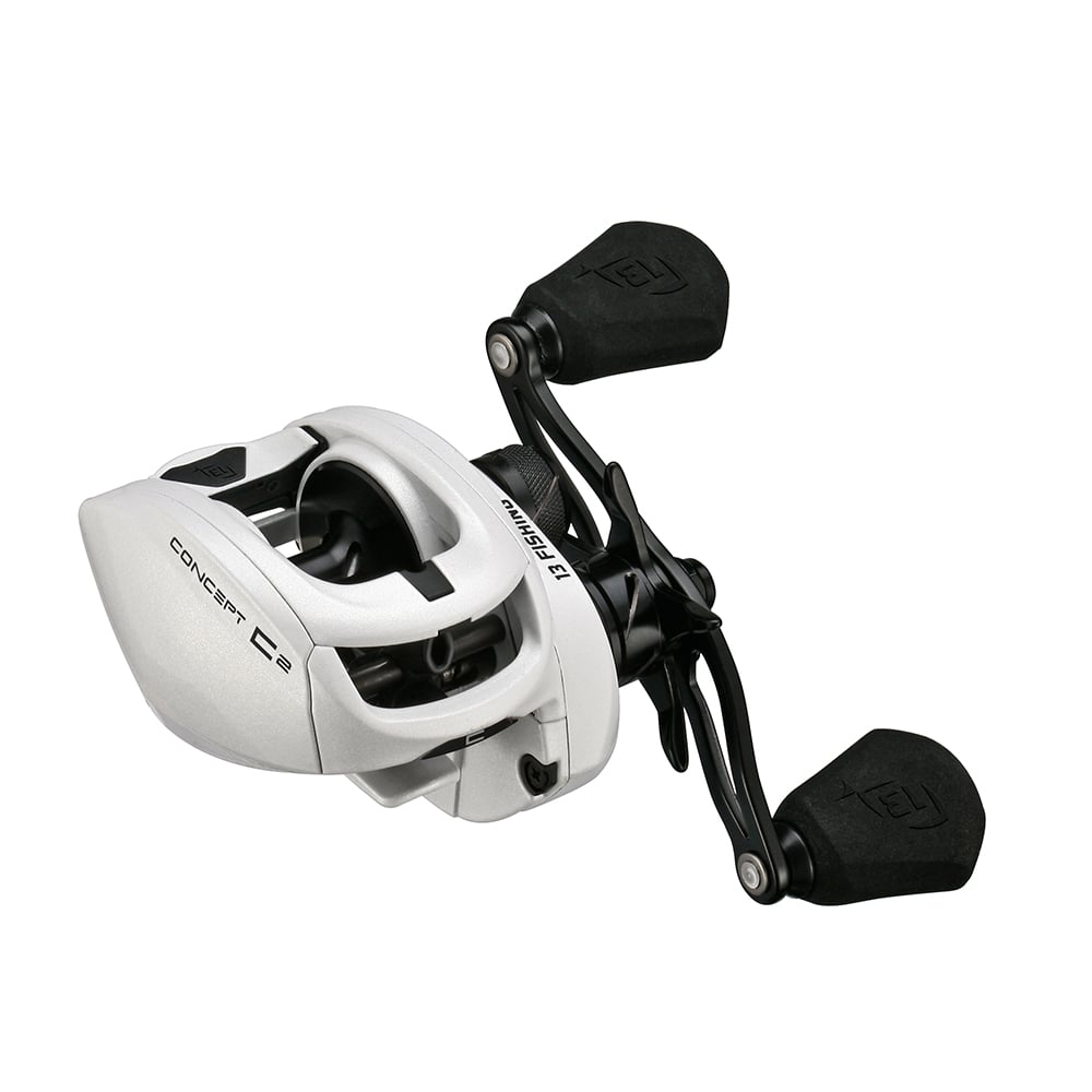 The 13 Fishing Concept C2 Casting Reel Left Hand 6.8:1 (C2-6.8-LH) features a white body, two black rubber handles, metallic silver accents, and "CONCEPT C2" labeling; perfect for left-handed anglers.