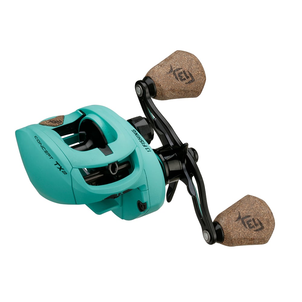 The 13 Fishing Concept TX2 Casting Reel Left Hand 7.5:1 features a turquoise body, two cork grips, black accents, and "CONCEPT TX2" on the side.